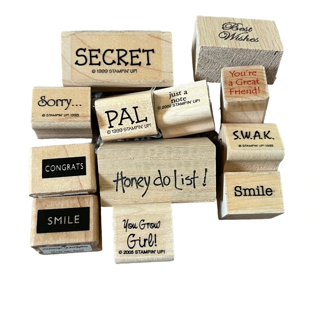 Lot of 12 mini word rubber stamps. Most of the stamps are brand new.